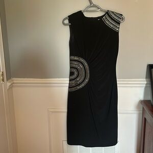 Black dress to the new with gold beading